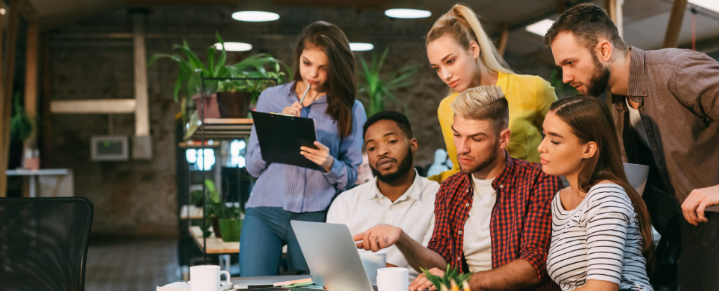 Marketing team discussing how much PPC agencies charge